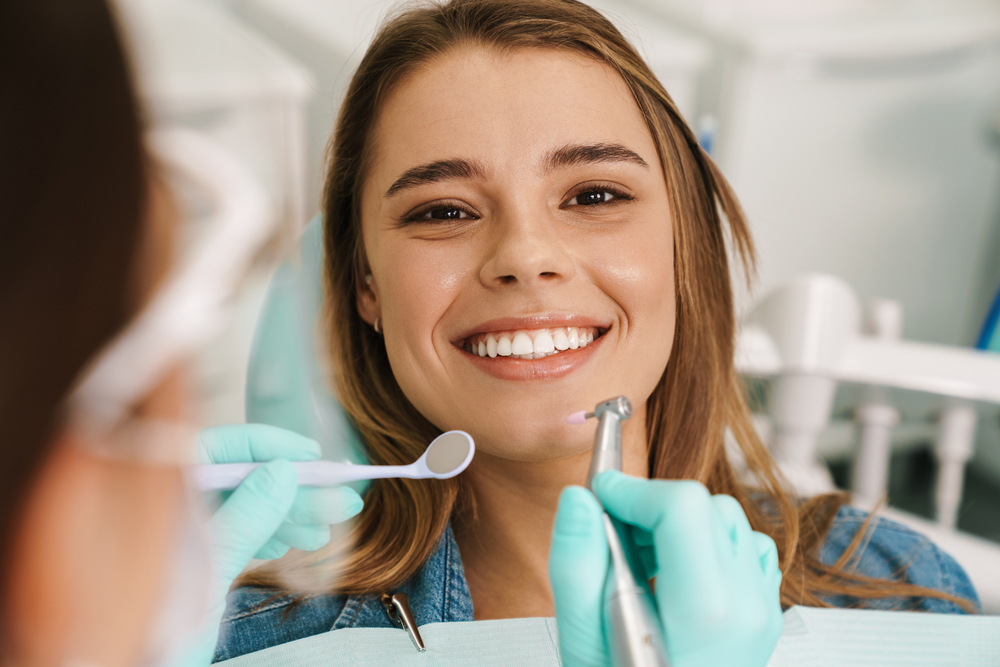 A patient relaxing during a professional dental procedure, demonstrating the comfortable and patient-focused experience at Cupertino Dental - Cupertino Dental
