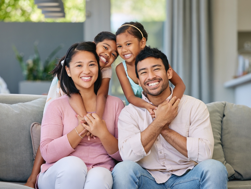 A smiling family enjoying time together, representing the family-friendly dental care provided for patients of all ages at Cupertino Dental - Cupertino Dental